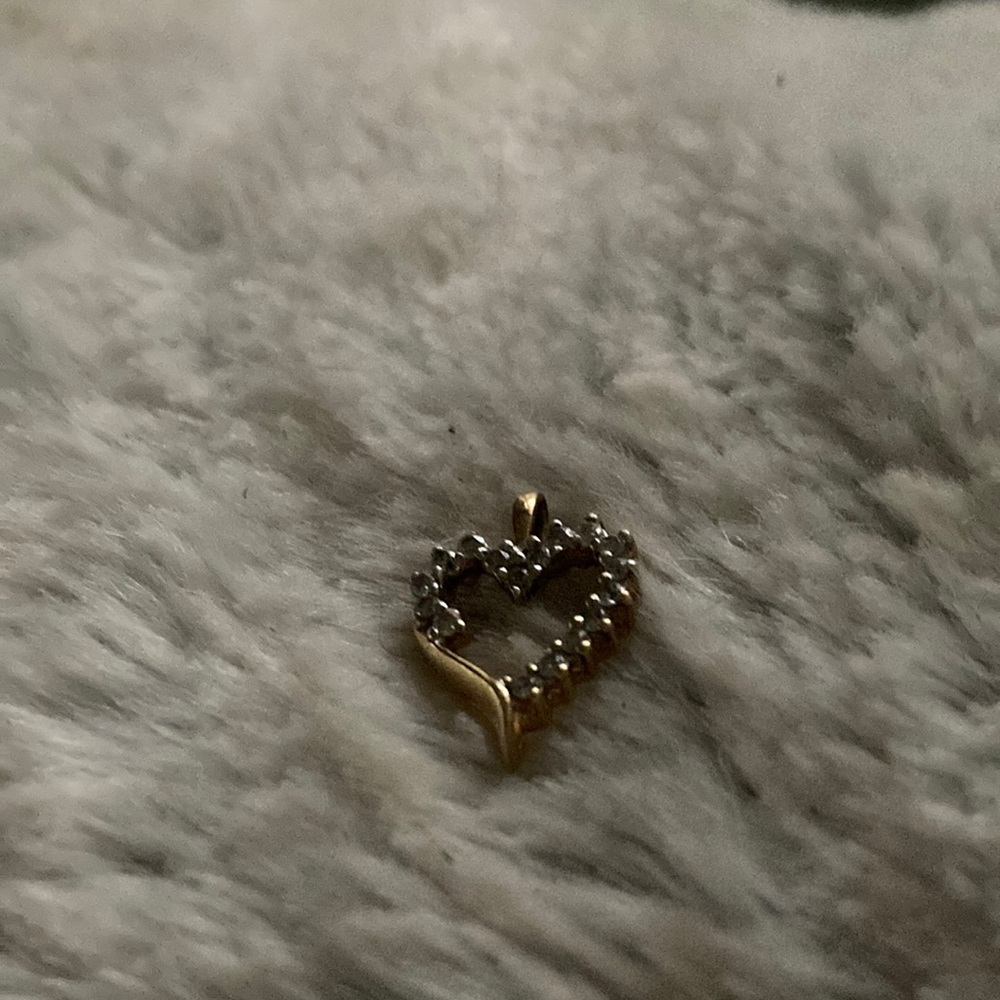Real gold and diamond heart charm. 10K.